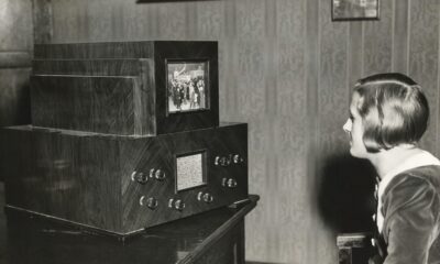A woman watches television in the 1930s